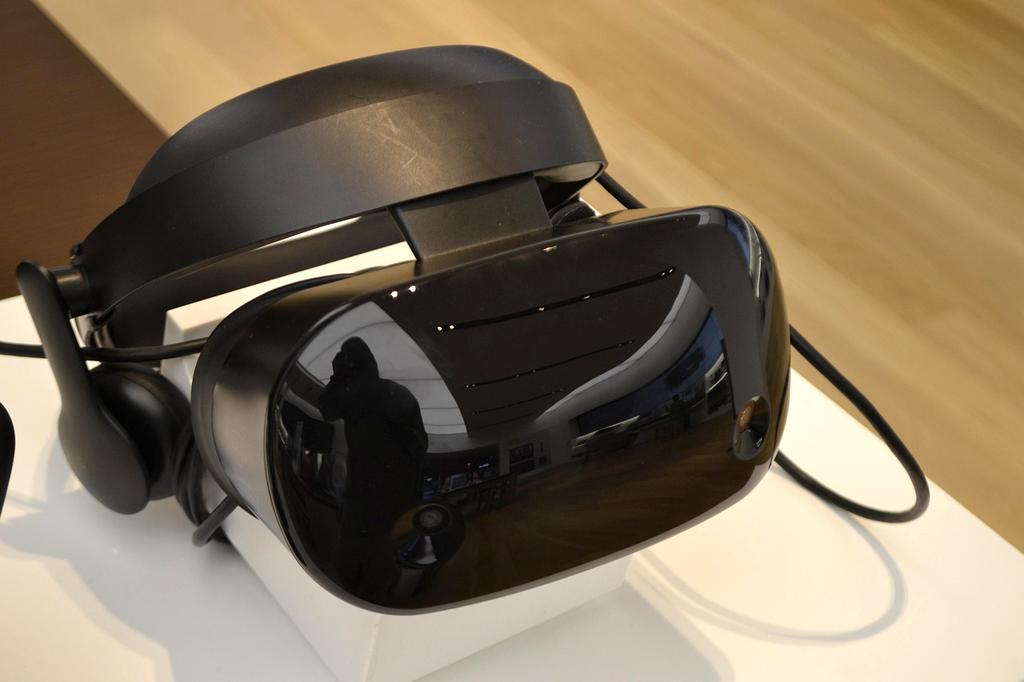 Vibrant VR event with diverse crowd enjoying virtual reality experiences